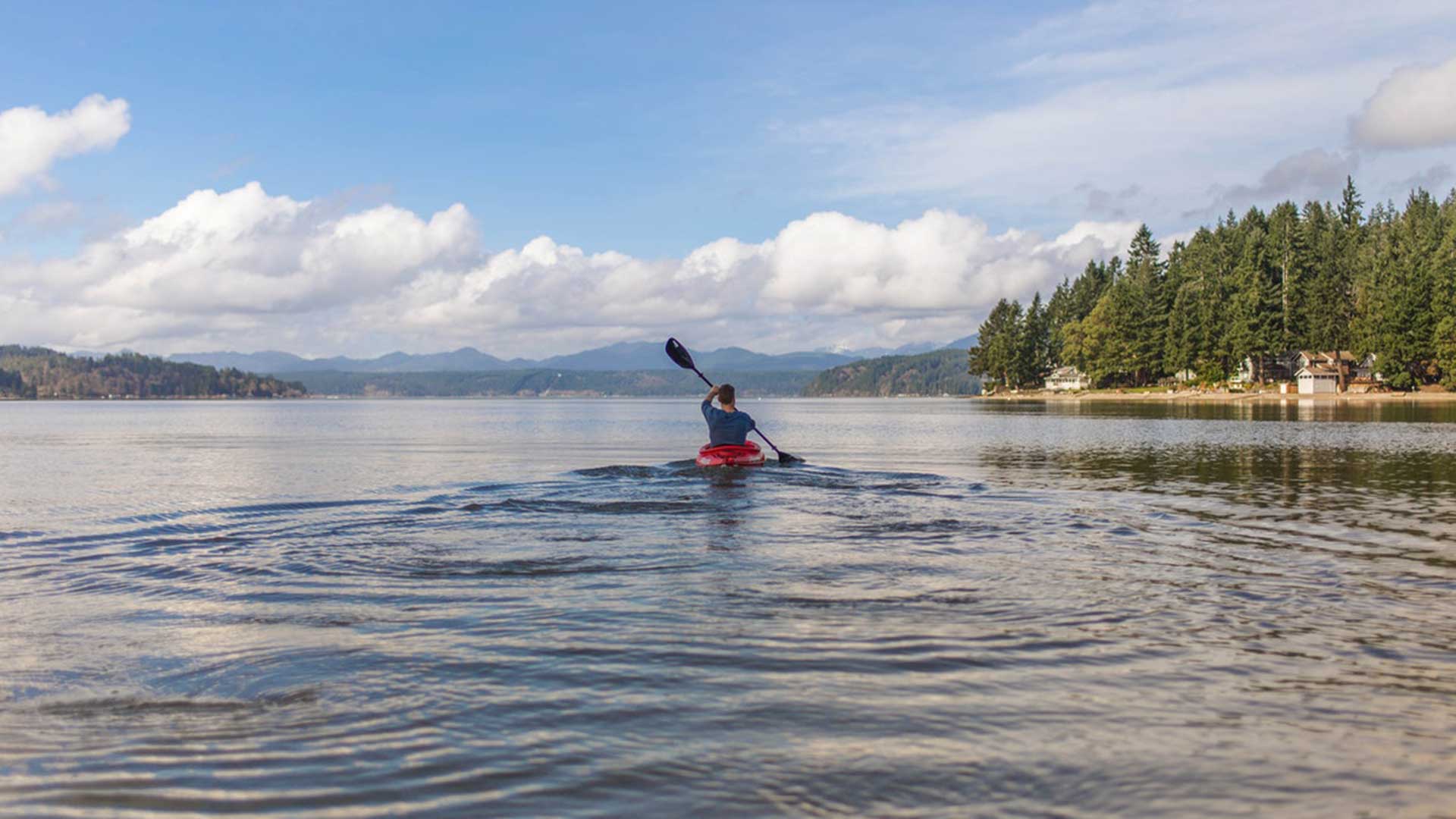man kayak fishing