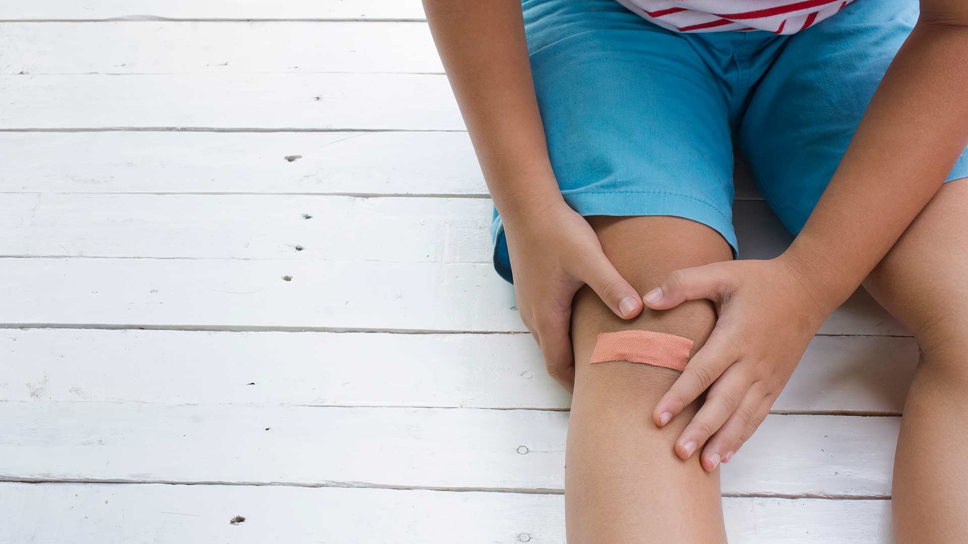 Boy with wound on his knee