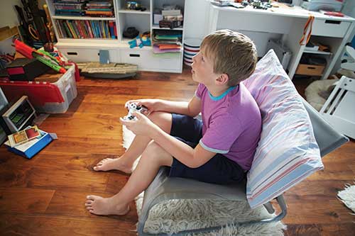 Boy playing video games