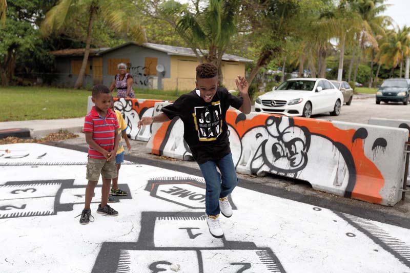 Child playing in dead end road