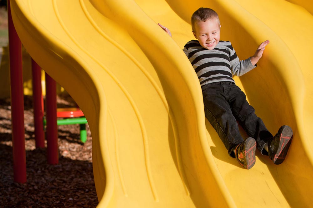 Child on a slide.
