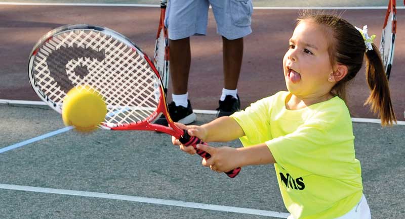 Girl playing tennis