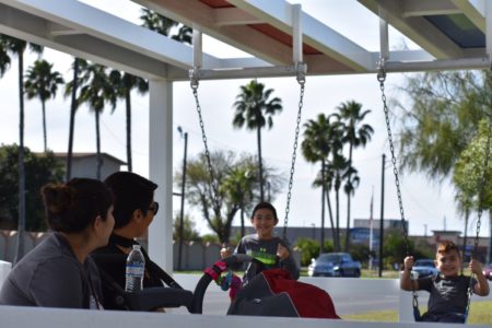 Kids swing at bus stop Kids swing at bus stop