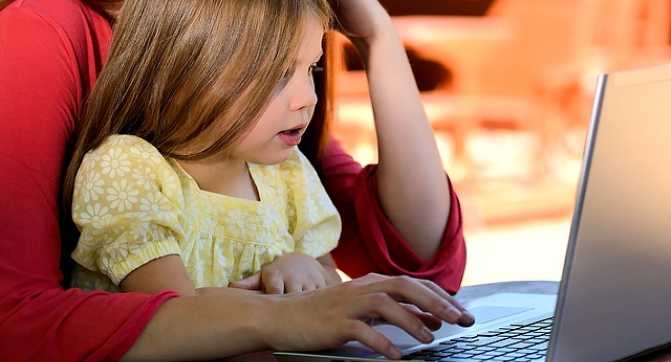 Mom and Daughter together on the computer