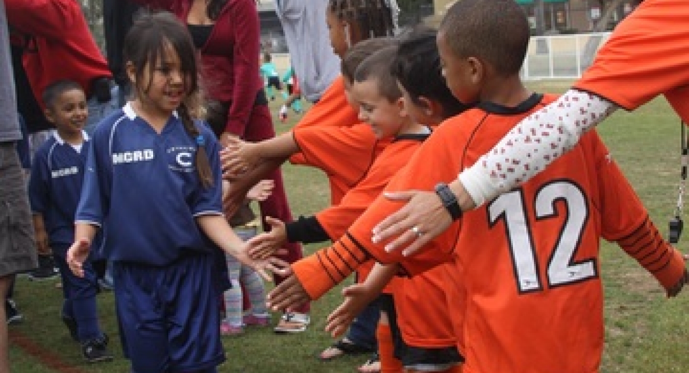 Kids shaking hands after a game
