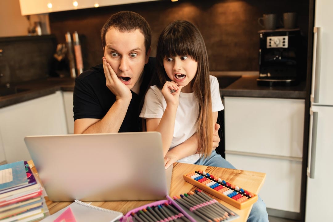 Father and daughter overwhelmed by homework