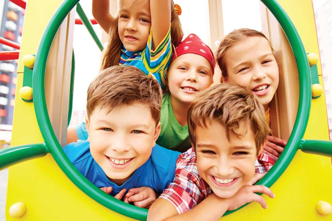 Kids playing on new playground