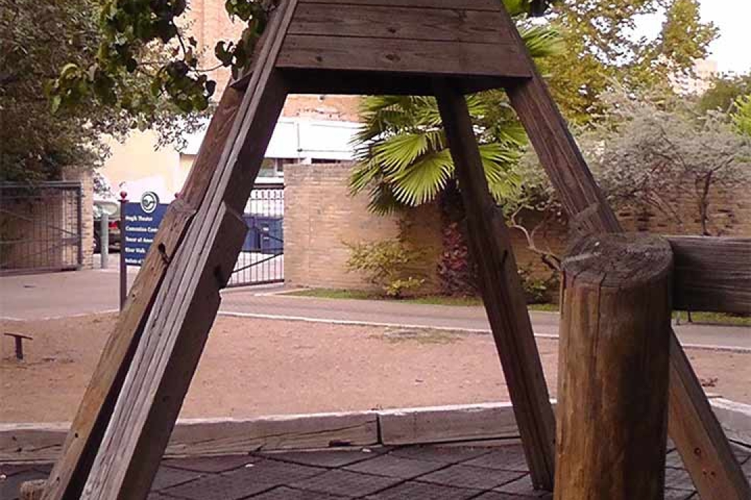 Hemisfair Park Playground - frame with missing tire swing