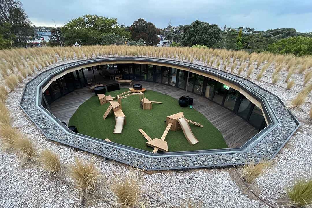 Aerial view of Outdorable modular timber play equipment installed in a unique octagonal sunken early childhood education centre