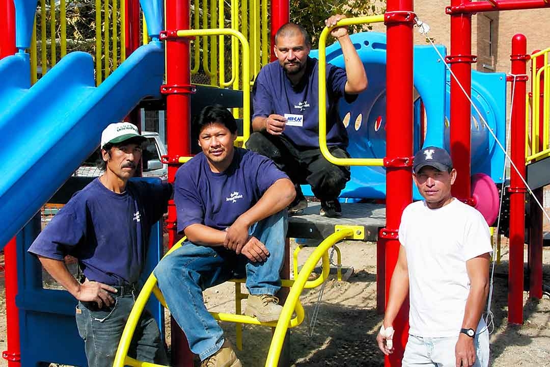 chosing a playground installer - group of builders after a job well done
