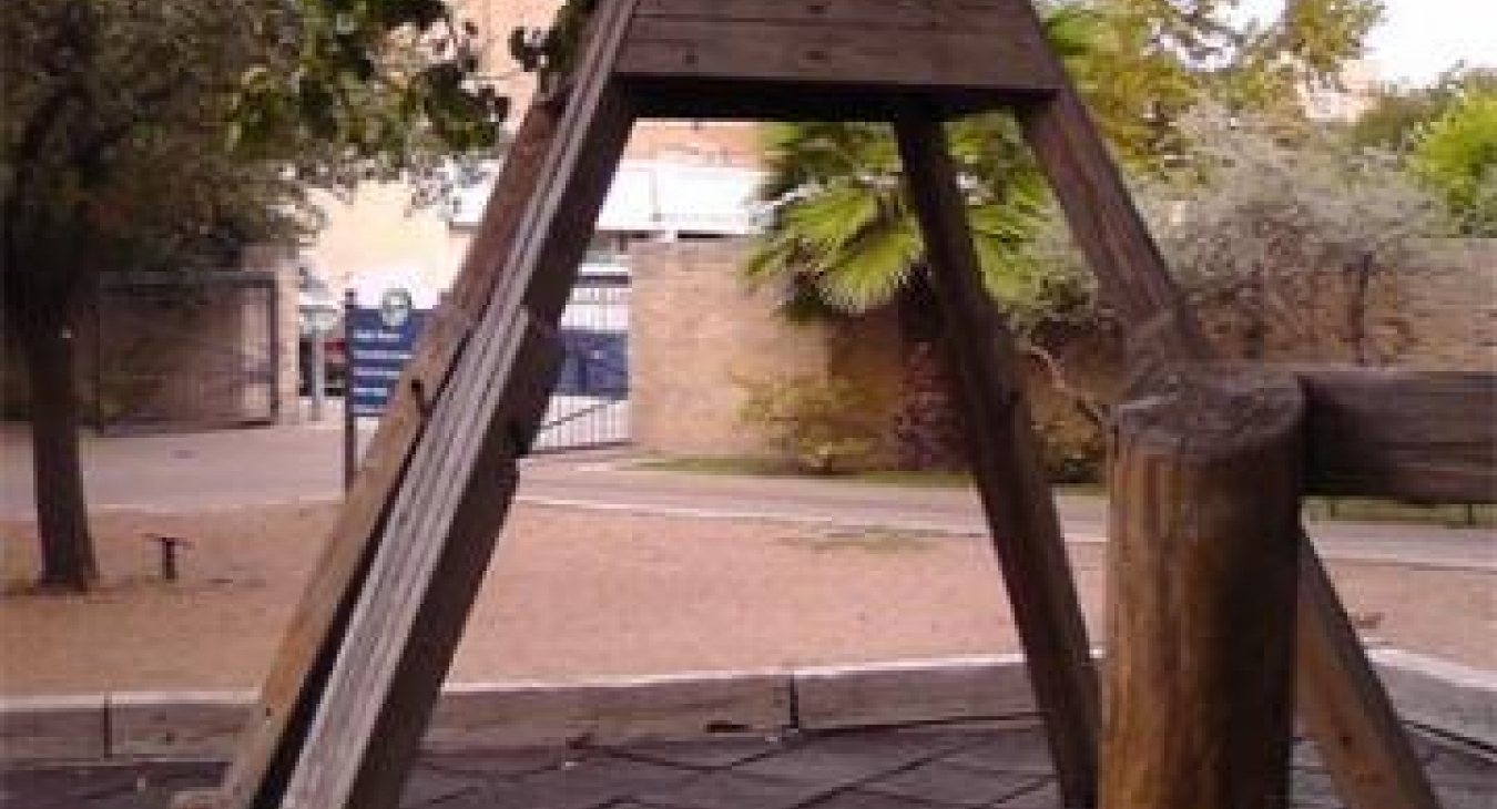 Hemisfair Park Playground - frame with missing tire swing