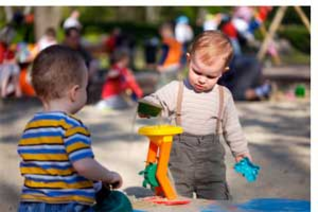 Babies playing with sand