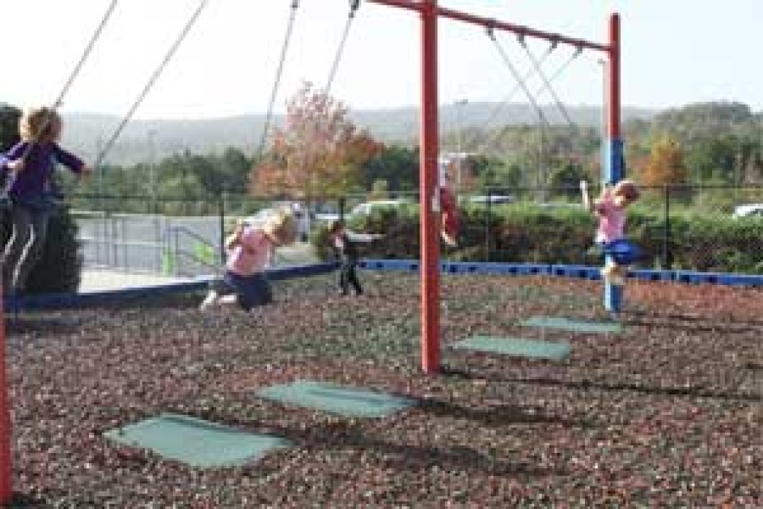 Rubber mats under swings
