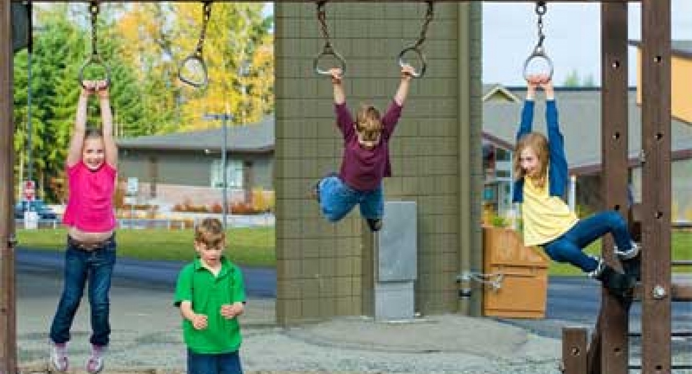 Children playing on a school playground during recess. Shutterstock: Mat Hayward