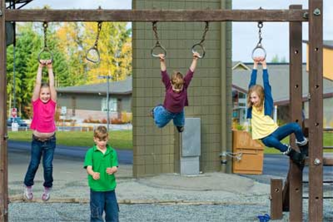 Children playing on a school playground during recess. Shutterstock: Mat Hayward