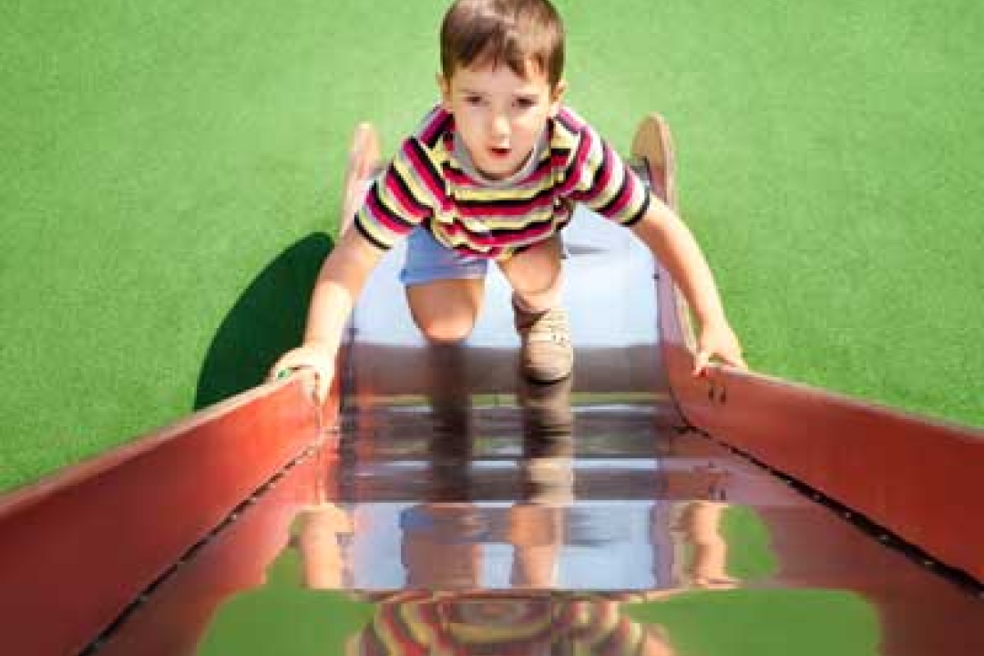 Climbing a slide - unintended use - Shutterstock 102166951