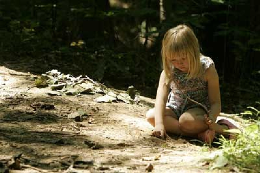 Child playing in dirt