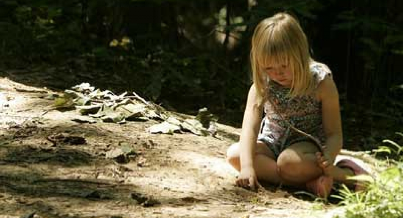 Child playing in dirt