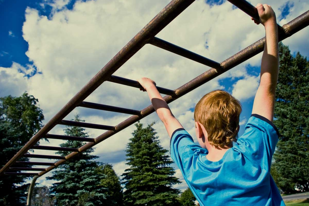Brachiating on monkey bars.