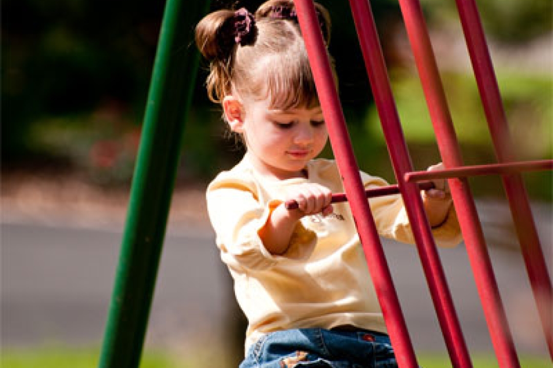 Girl on a play structure