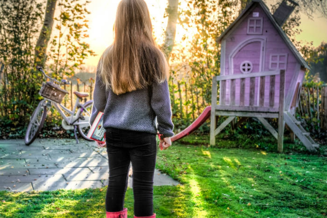Girl in her backyard
