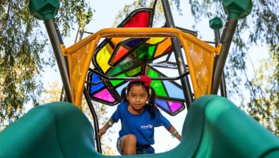 Child on a slide in Carr Park