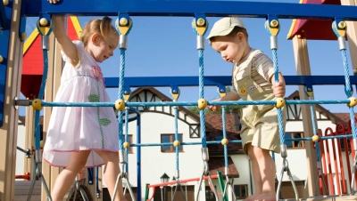 Children playing safe on a playground