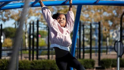 Child on monkeybars