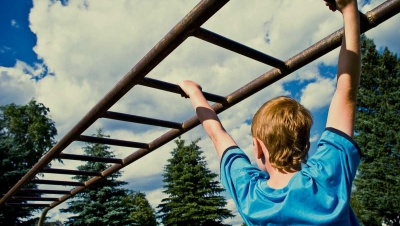Brachiating on monkey bars.