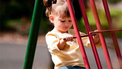 Girl on a play structure