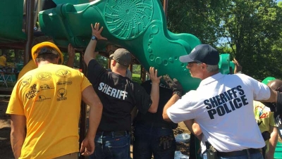 Rockford Sheriff's Department volunteer to help build playground