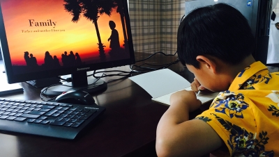 Child working on a computer