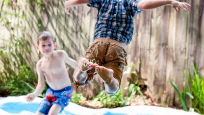Boys playing in water.